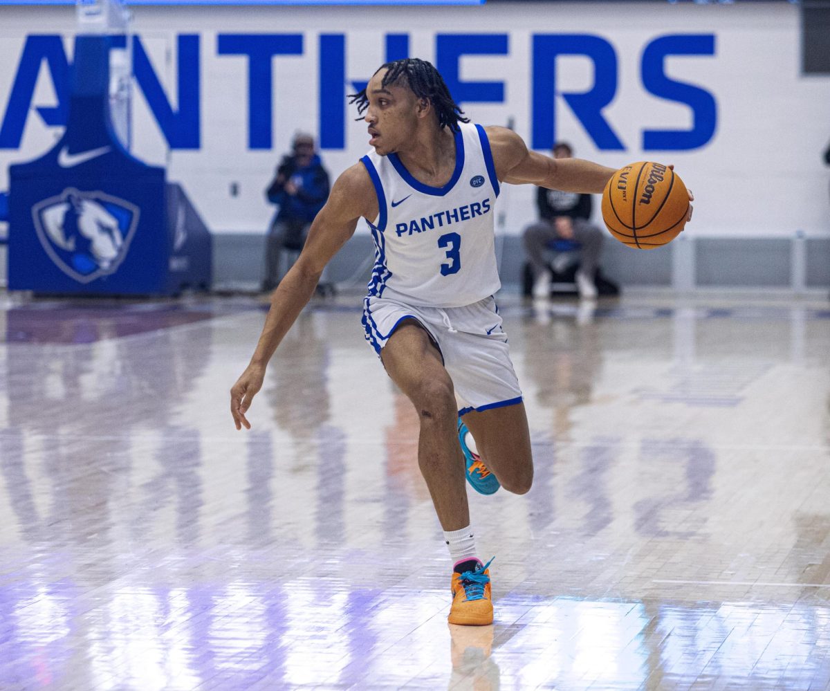 Senior guard NaKyel Shelton figuring out what to do with the basketball during the second half of Eastern’s lost to Southern Indiana 64-60 on Saturday.