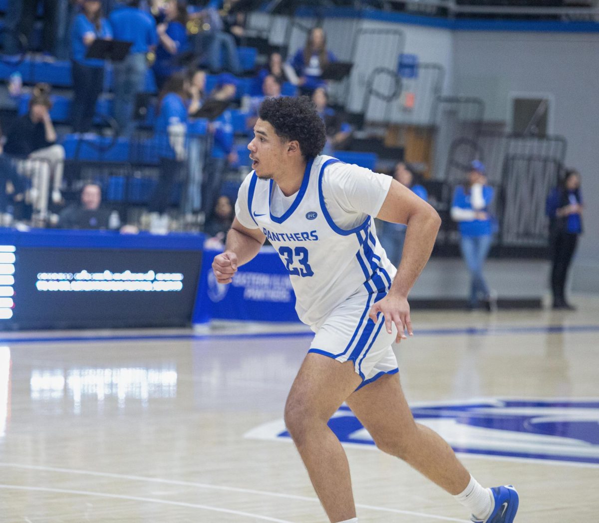 Senior forward Rodolfo Bolis runs down the lane to try for a rebound during the second half of Eastern’s loss to Southern Indiana 64-60 on Saturday.