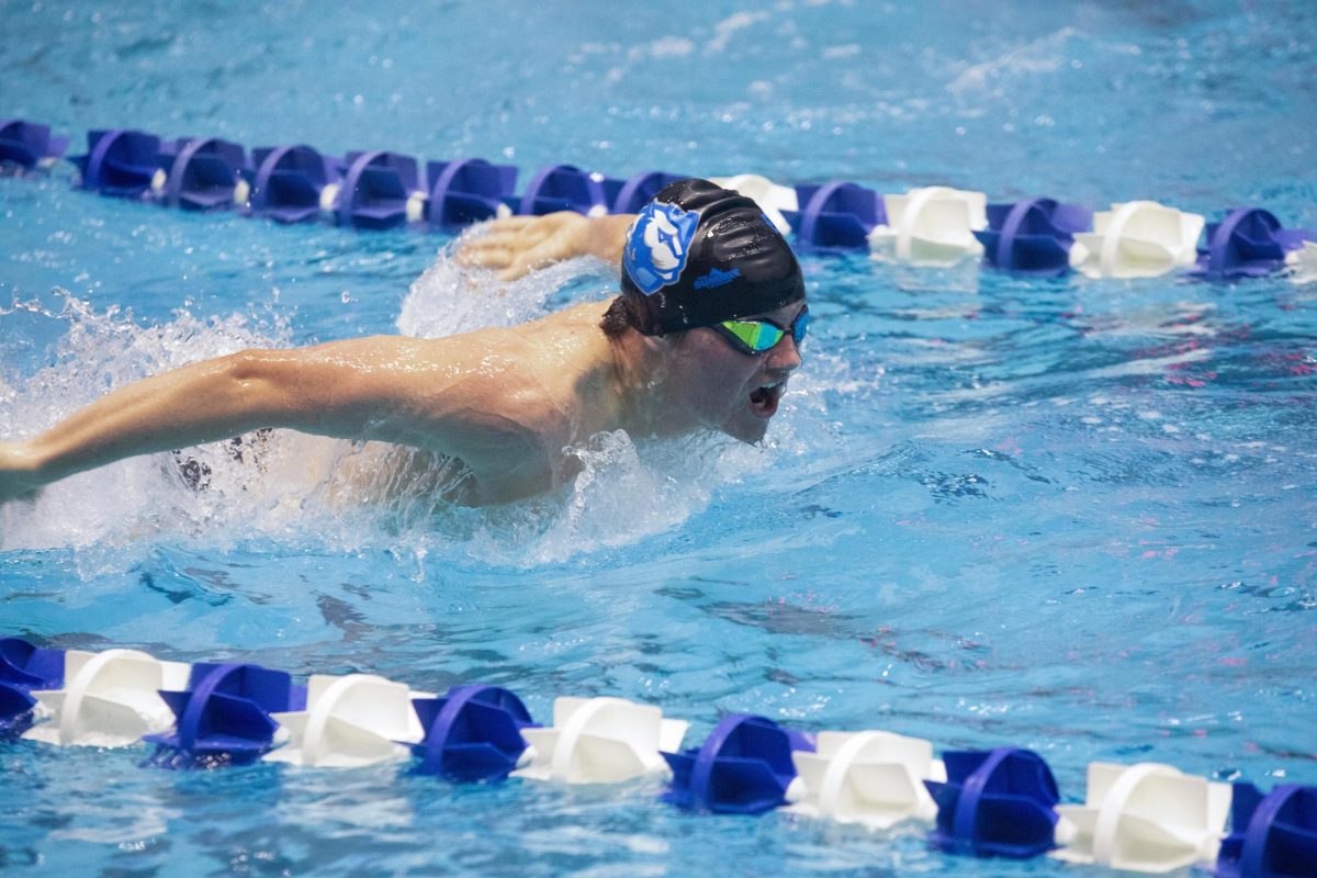 Sophomore Butterfly swimmer Gavin Frigon competes in the boys 100-yard Butterfly and finishes with a time of 54.21 during the Eastern Illinois men’s loss to Lewis University 152-110 on Friday evening.