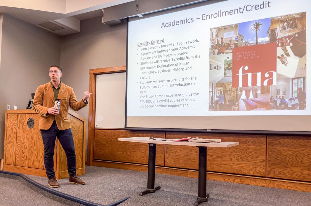 Professor Jay Grabiec discusses the enrollment and academic benefits for students while on the Florence, Italy trip during a study abroad meeting in the Lumpkin Hall on Tuesday.