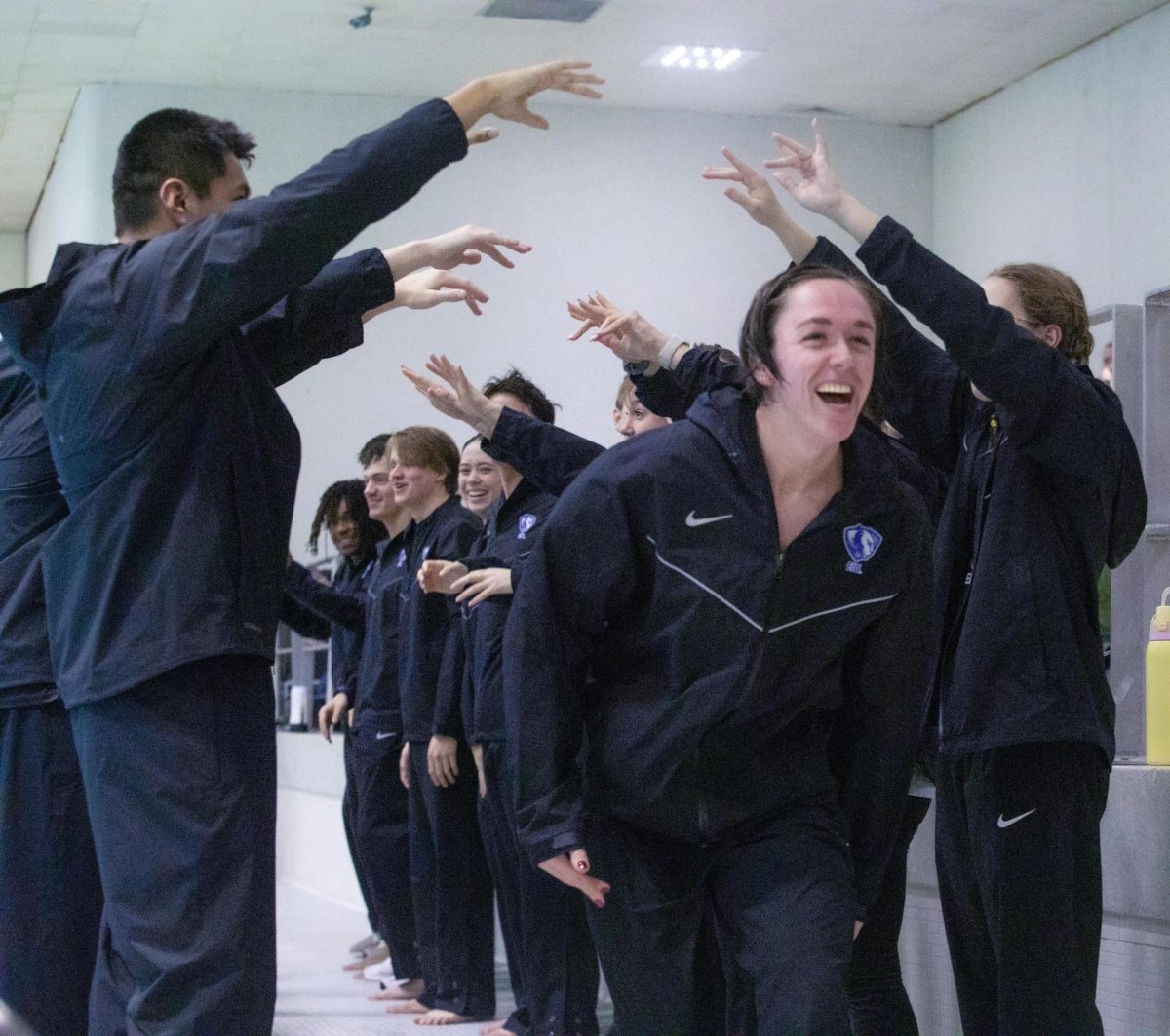 Fifth year Freestyle and Breaststroke swimmer Emma Keith enjoying her senior night as her teammates made a tunnel for her during the Eastern Illinois women’s win against Lewis University 142-119 on Friday evening.