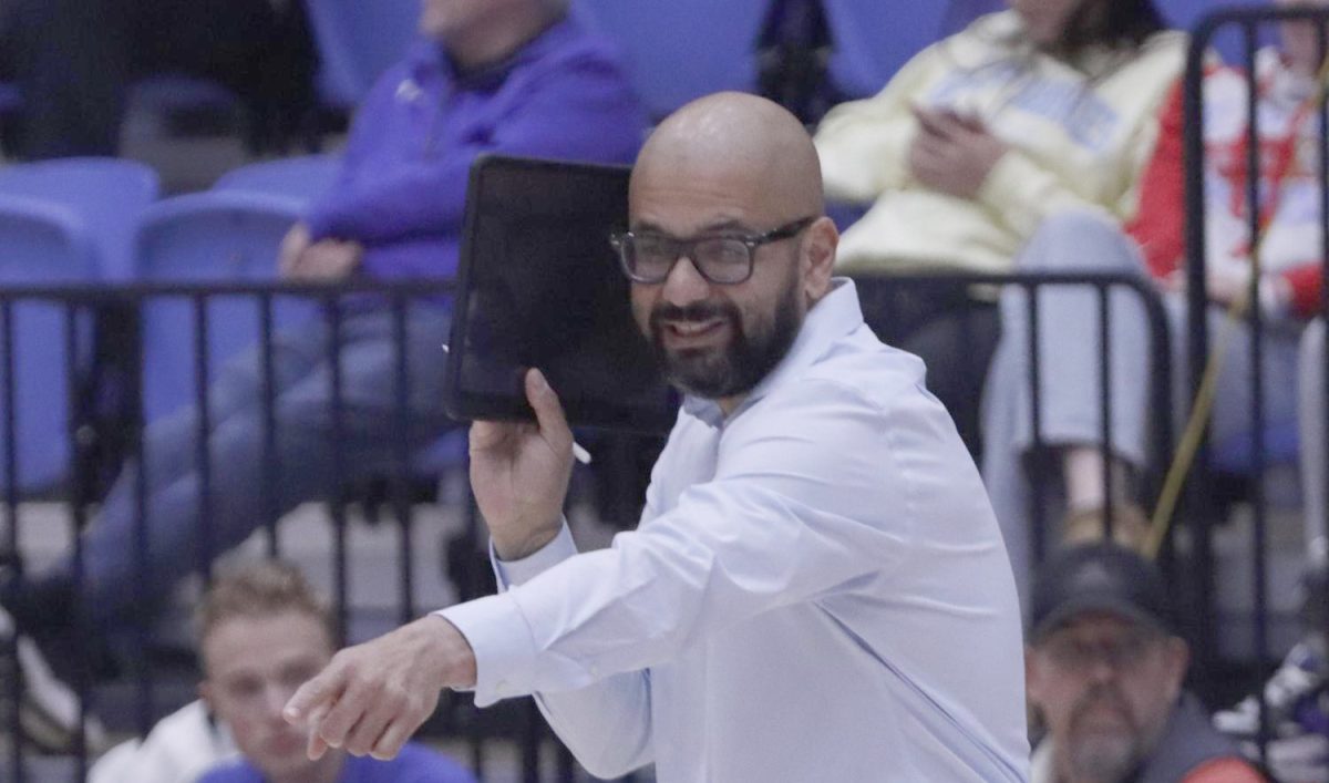 (Thumbnail Edition) Associate Head Coach Manolo Concepcion talks to the Volleyball team from the side lines during the game against Tennessee  State at the Groniger Arena on the Eastern Illinois University campus, Nov 20,2024. Charleston ILL. 