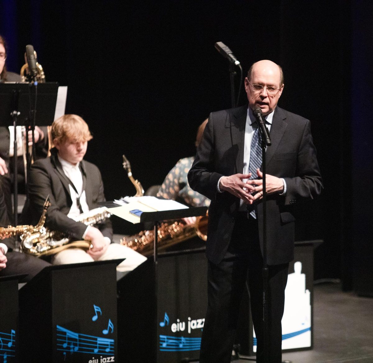 Director of the Eastern Illinois Jazz Ensemble Sam Fagaly thanking everyone involved that put on the jazz concert before the last song of the night in the Theatre in the Doudna Fine Arts Center on Friday.