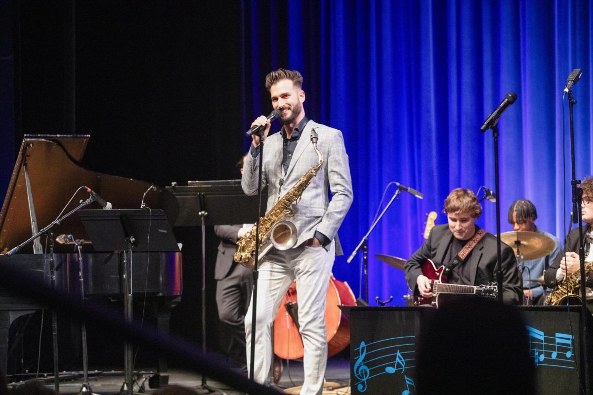 Saxophonist Chad LB smiles while talking about his musical journey at the Eastern Jazz Festival. LB has been playing saxophone since he was 9 years old.