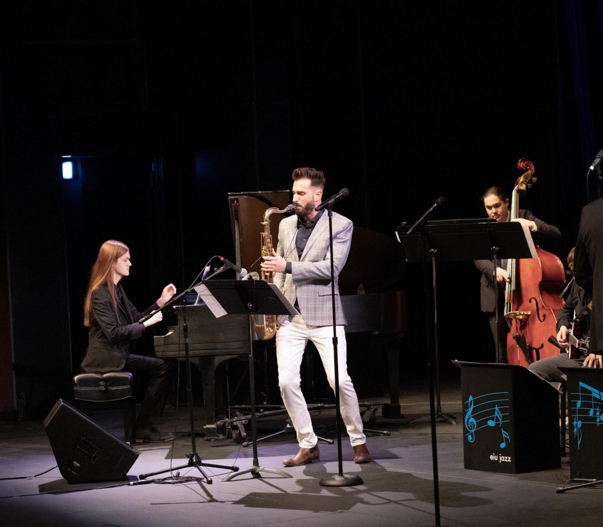 Saxophonist Chad LB performing with the Eastern Illinois Jazz Ensemble during the first performance of the Eastern Jazz Festival in the Theatre in the Doudna Fine Arts Center on Friday.