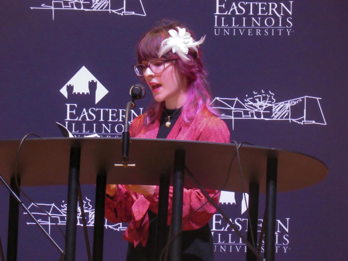 Graduate student Erica Heldenbrand reads her short story "Snow Angels" at the Lions in Winter Festival in the Dvorak Concert Hall on Thursday