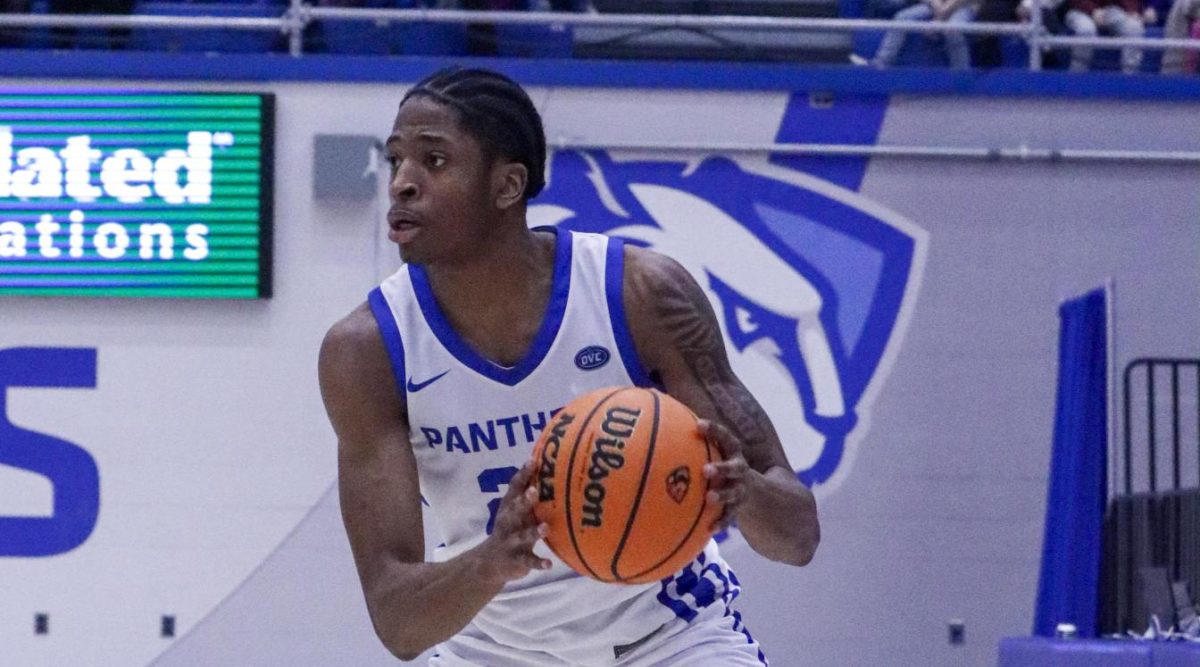 (Thumbnail Edition) Freshman forward Terry McMorris gets ready to drive to the hoop during Eastern’s win against Calumet College of St. Joseph 87-57 at the Kid’s Day Game on Friday