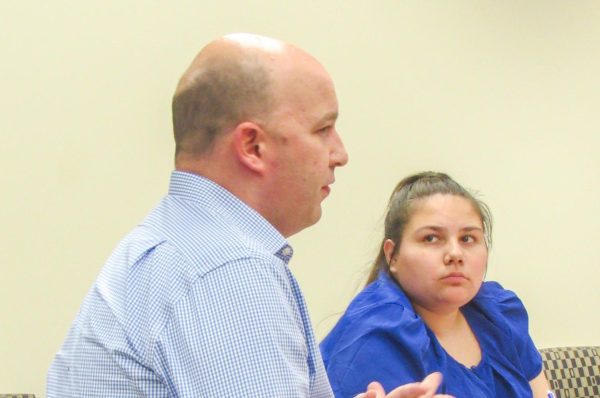 (Thumbnail Edition) Executive Director for Information Technology Services Ryan Gibson presents to the student senate about the use of campus blue phones at the Student Senate weekly meeting in the Witters Conference room on the fourth floor of Booth Library on Wednesday.