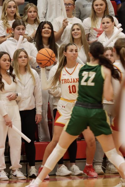 Senior forward Blair Ritchey passes in the ball during Charleston high school girls' basketball team 29-28 win over Matoon High School on Feb. 1 at Baker Gym in Charleston, Illinois.