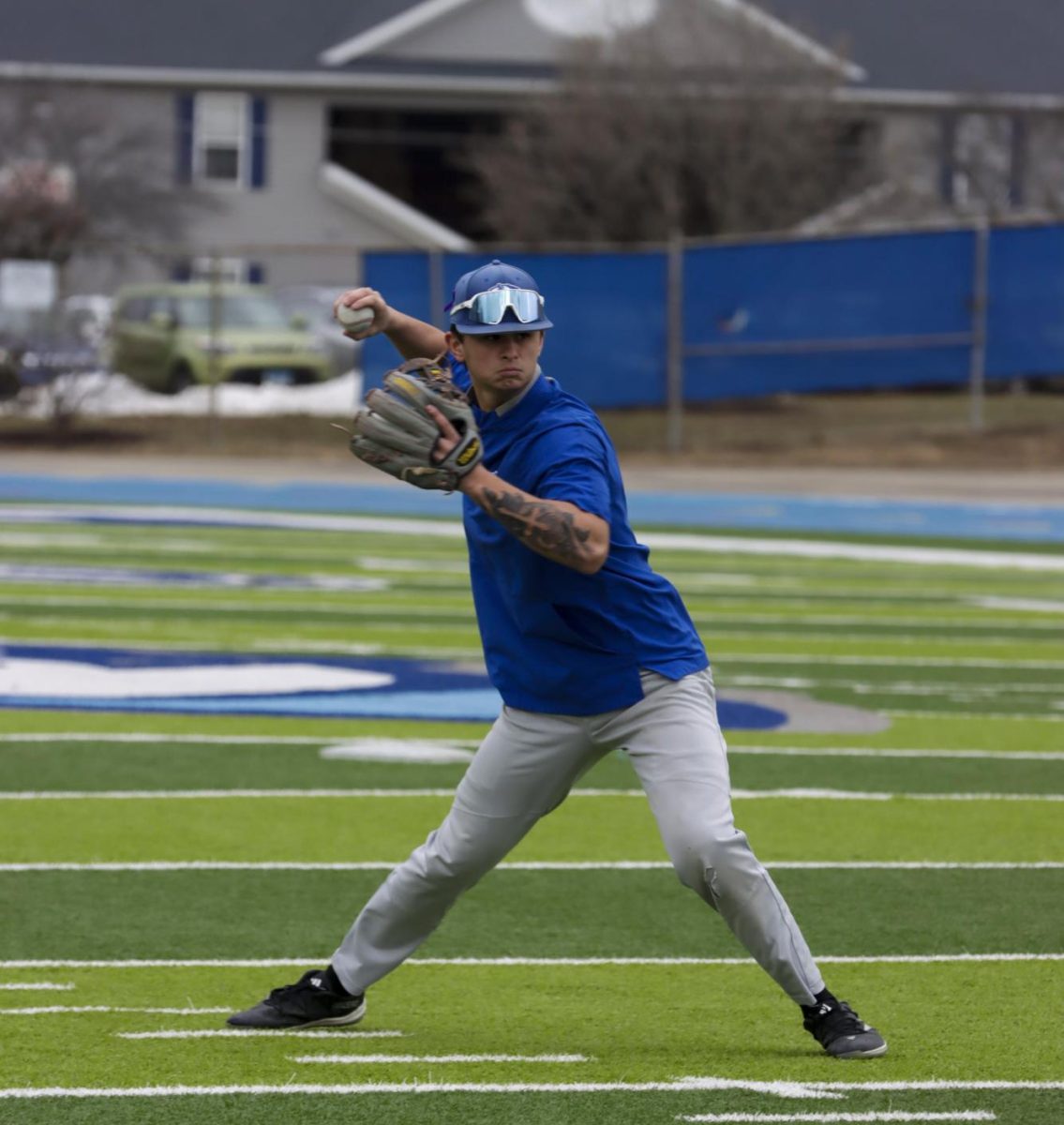 Eastern Illinois University baseball senior utility player Tyler Castro fields a ground ball during the team's first intrasquad scrimmage of the season on Jan. 31.
