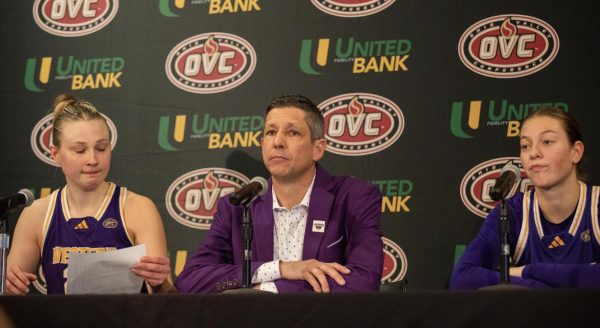 Western Illinois University's head women's basketball coach J.D. Gravina (middle), junior forward Mia Nicastro (left) and sophomore guard Reagan McCowan answer questions during the press conference after a win over UT Martin 78-72 in the first round of the Ohio Valley Conference Tournament Wednesday at the Ford Center in Evansville, Ind. The Leathernecks will play Eastern tomorrow. 