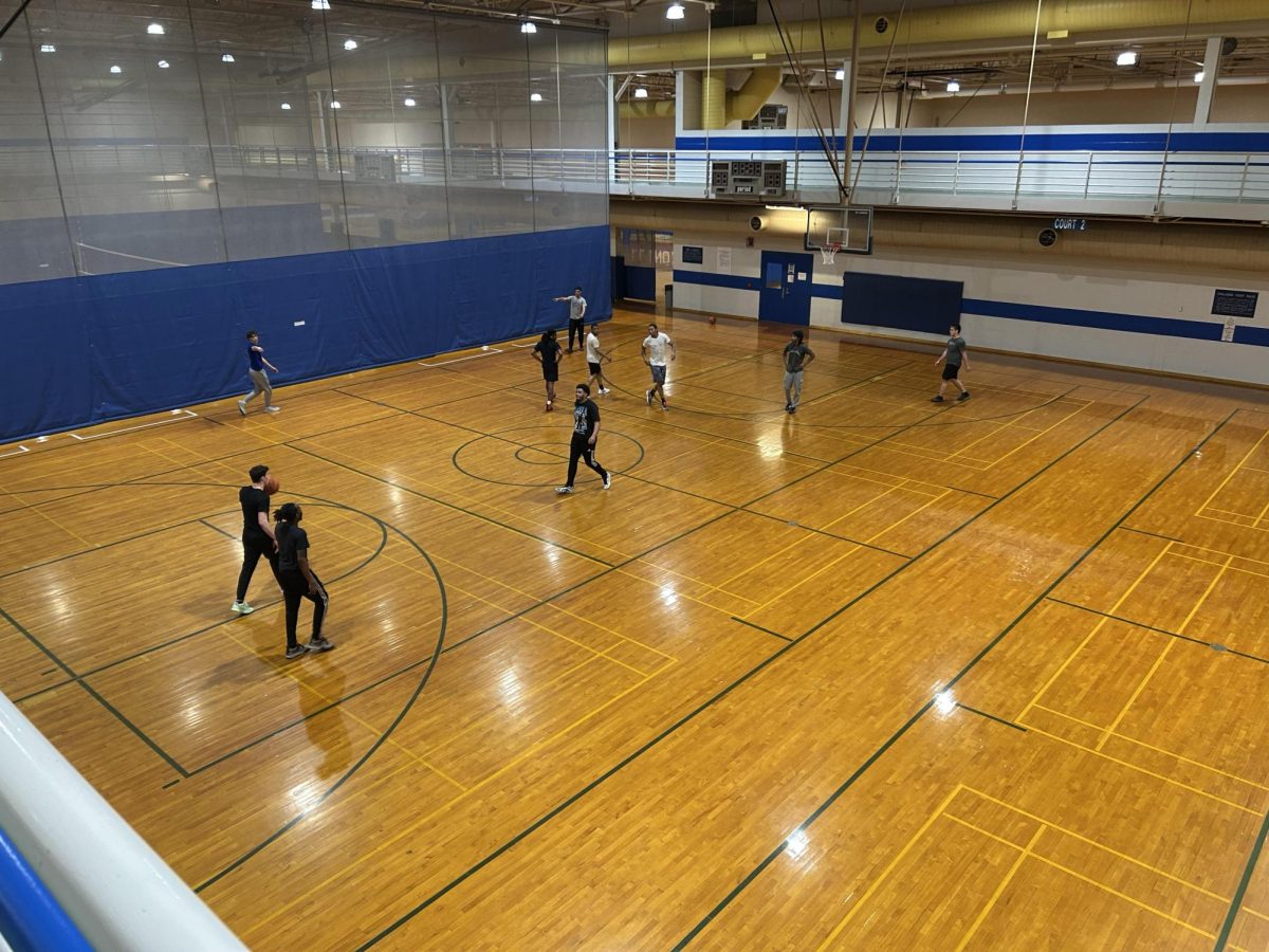 Eastern Illinois University students playing basketball at the EIU Recreational Center on March 6. Any facility in the center with a wood floor will be closed beginning on Monday while it undergoes renovations. 