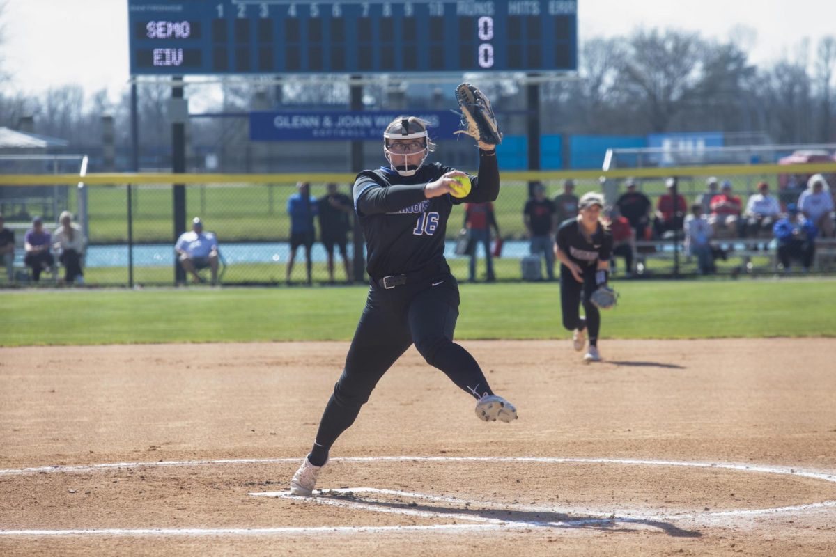 Eastern Illinois University softball sophomore pitcher McKenzie Oslanzi preparing to deliver a pitch at Williams Field during Eastern’s first game against Southeast Missouri State as Eastern split the games as Eastern lost the first game 3-0 and won the second 8-5 on Friday.