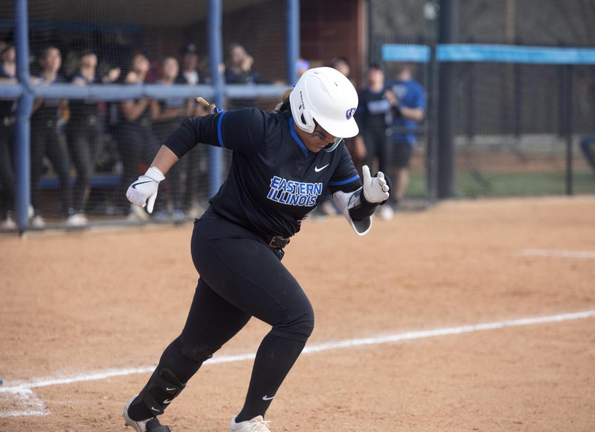 Eastern Illinois softball freshman catcher Kira Manganello running to first base after a foul ball at Williams Field during Eastern’s first game against Southeast Missouri State as Eastern split the games as Eastern lost the first game 3-0 and won the second 8-5 on Saturday.