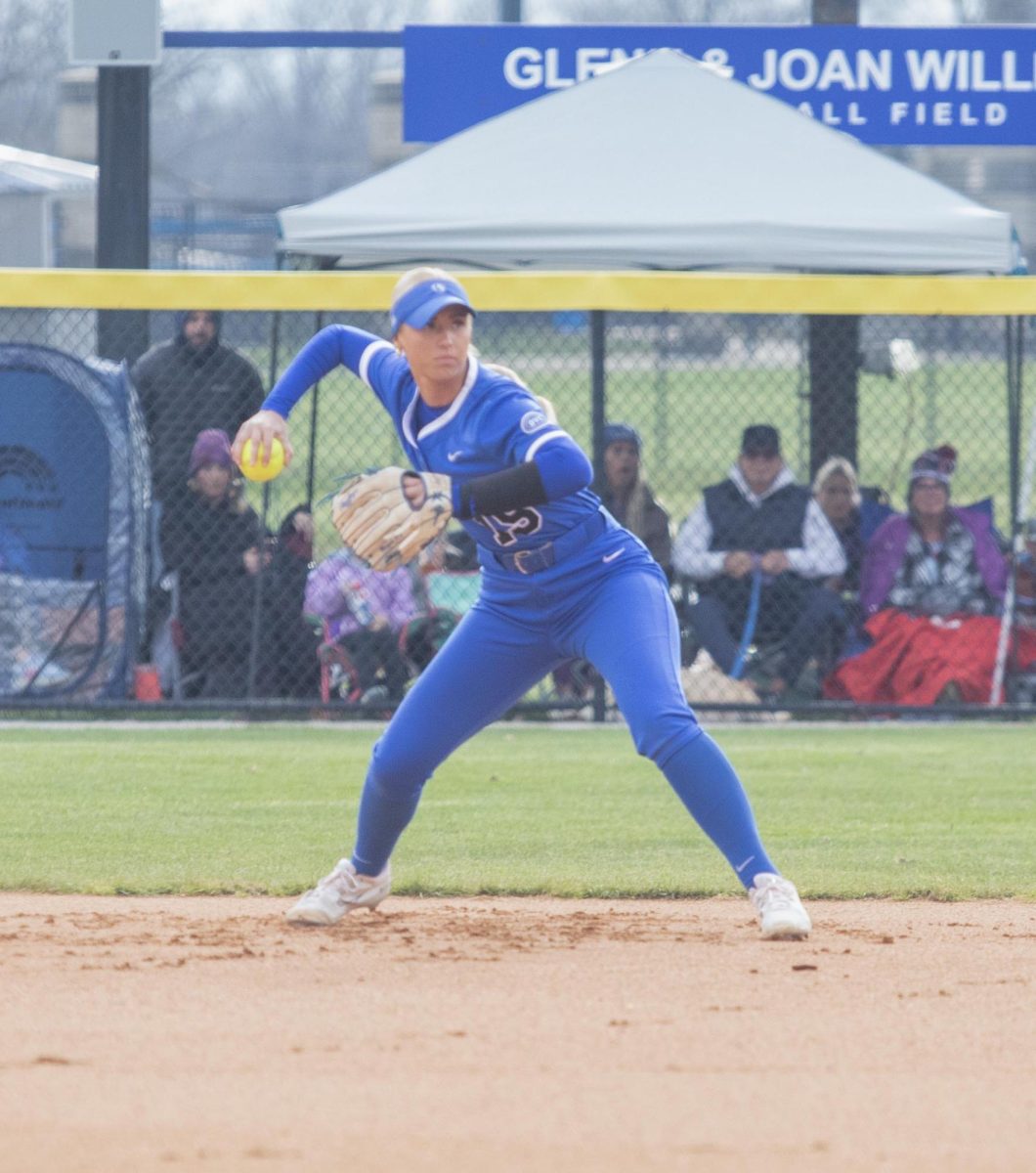 Eastern Illinois softball junior infielder Mia Mazzola throwing the ball to first base after fielding it at Williams field as Eastern lost to Washington 3-2 in eight innings on Thursday.