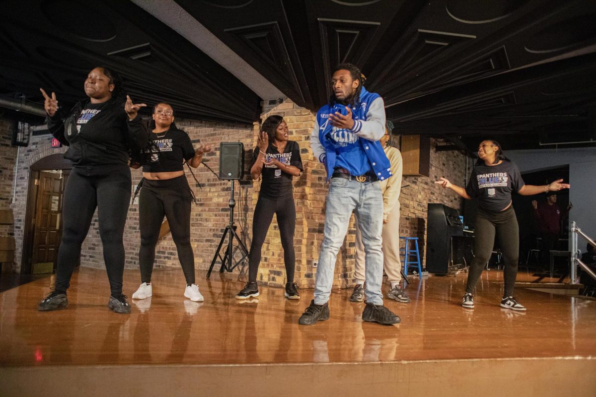 Some members of the crowd dancing to begin the Strong M.A.N. talent show at 7th Street Underground in the Martin Luther King Jr. Union on Saturday.