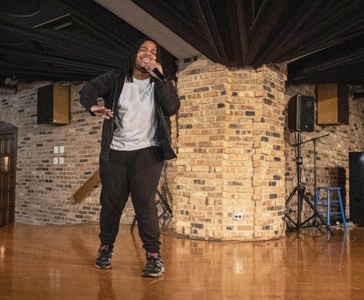 Eastern Illinois junior business management major Christopher Redman also known as Prodigy sings a song he wrote as the first talent in the Strong M.A.N talent show at Seventh Street Underground in the Martin Luther King Jr. Union on Saturday.
