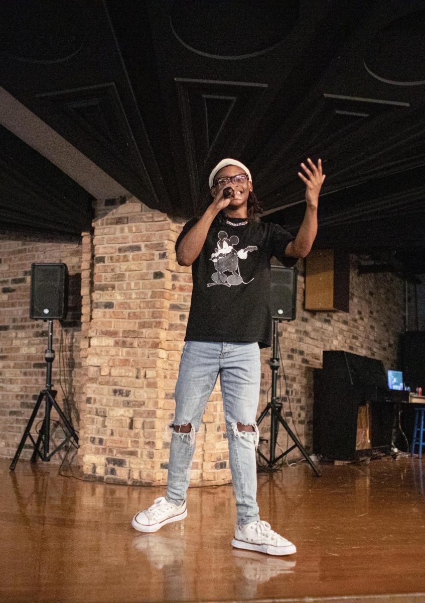 Eastern Illinois freshman computer information technology major Malik Washington singing a song he wrote as he got first place in the Strong M.A.N. talent show at 7th Street Underground in the Martin Luther King Jr. Union on Saturday.