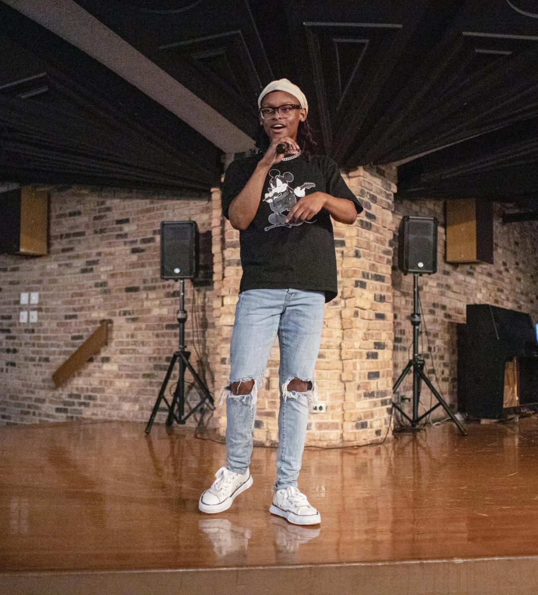Eastern Illinois freshman computer information technology major Malik Washington singing a song he wrote as he got first place in the Strong M.A.N. talent show at 7th Street Underground in the Martin Luther King Jr. Union on Saturday.