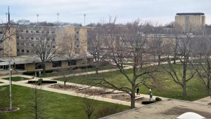 Students walk through South Quad for dinner in South Quad Dining on EIU's campus Monday. This semester, there are 438 less students on campus than last spring. 