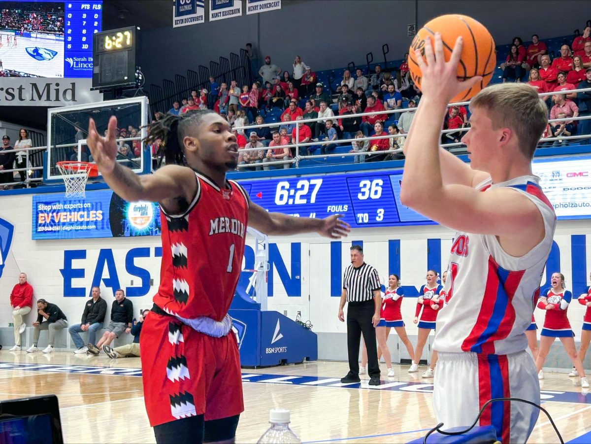 St. Anthony High School senior Will Fearday inbounds the ball while being closely guarded by Meridian High School junior guard Javionne Ranson in the fourth quarter of the Illinois High School Association Class 1A Super sectional game at Groniger Arena on Monday.