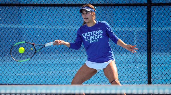 [Thumbnail Edition] Senior tennis player Luisa Renovales Salazar hits the tennis ball with her racket at the Darling Courts at the Eastern Illinois University campus in Charleston, ILL.