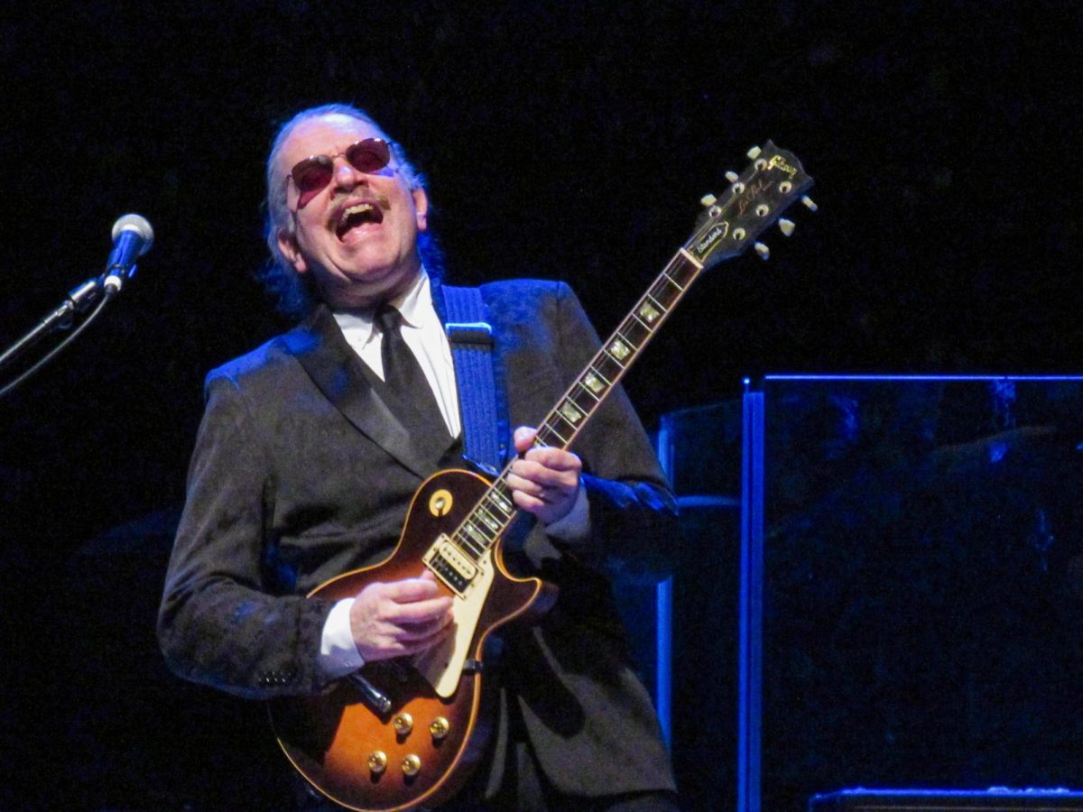 The Weeklings lead guitarist John Merjave performs "While my Guitar Gently Weeps" at The Weeklings Beatles Bash concert in the Dvorak Concert Hall in the Doudna Fine Arts Center on Saturday.