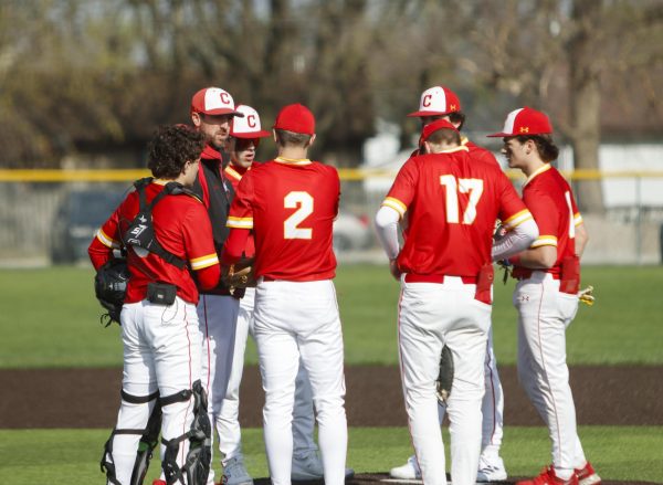 The Charleston High School baseball team has a mound meeting during game one of its doubleheader against the Mattoon Greenwave as Charleston lost both games 12-8 and 5-4 on Monday April 7.