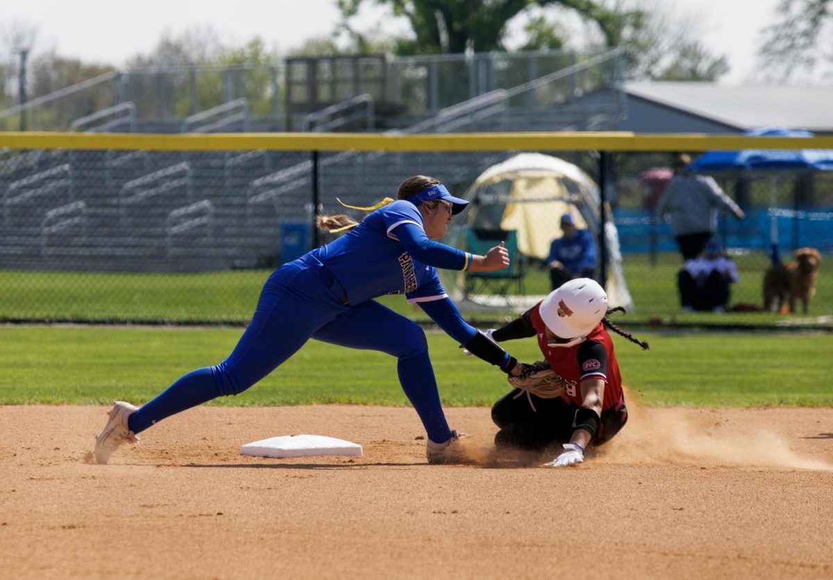 Eastern Illinois softball senior infielder Briana Gonzalez tagging out the runner at second base during Eastern’s loss to Southern Illinois University Edwardsville 3-1 on senior day at Williams field on Saturday.