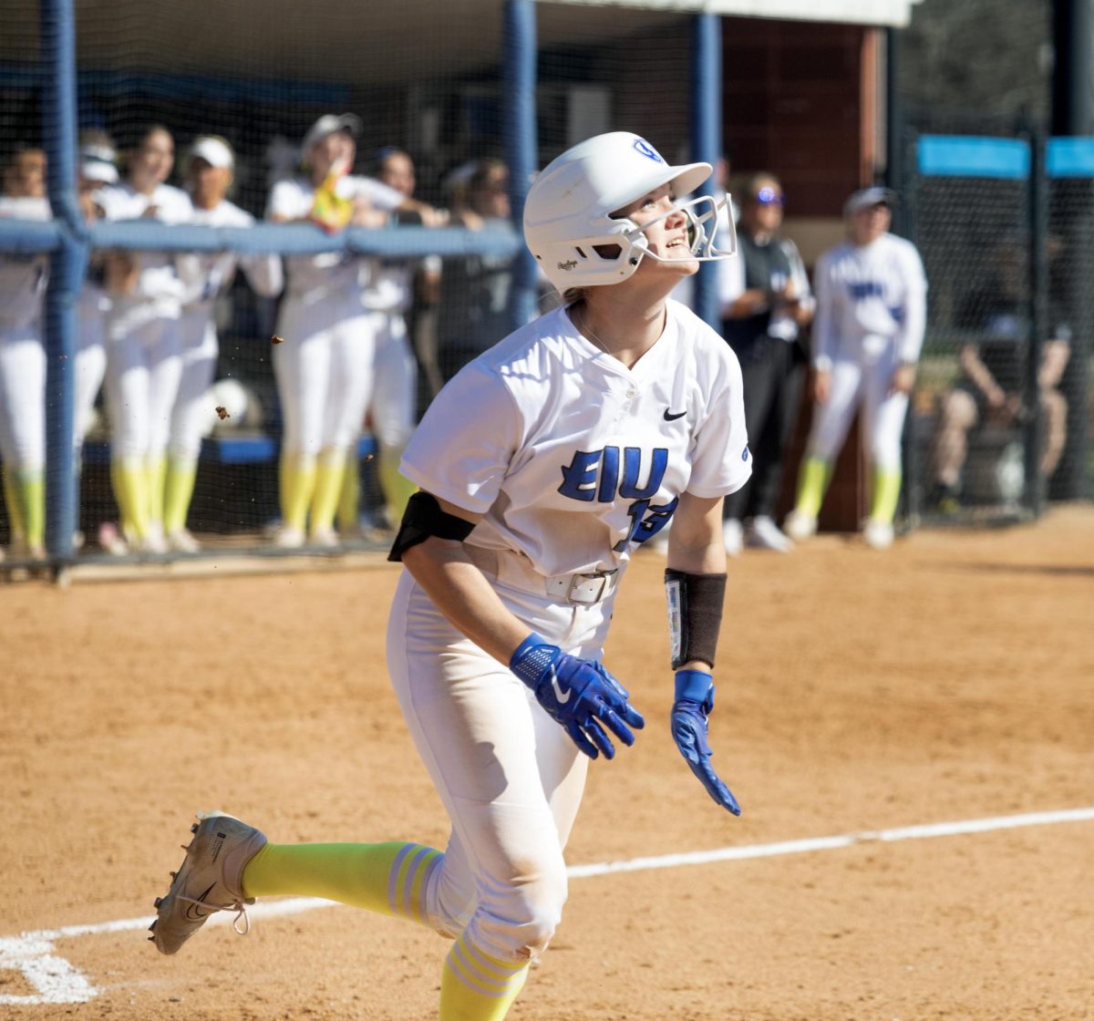 Eastern Illinois sophomore infielder Alisha Frederick looking up at her ball as it goes over the home run fence in the third inning during its annual care game and Eastern’s win against Southern Indiana 5-2 at Williams field on Saturday April 12.