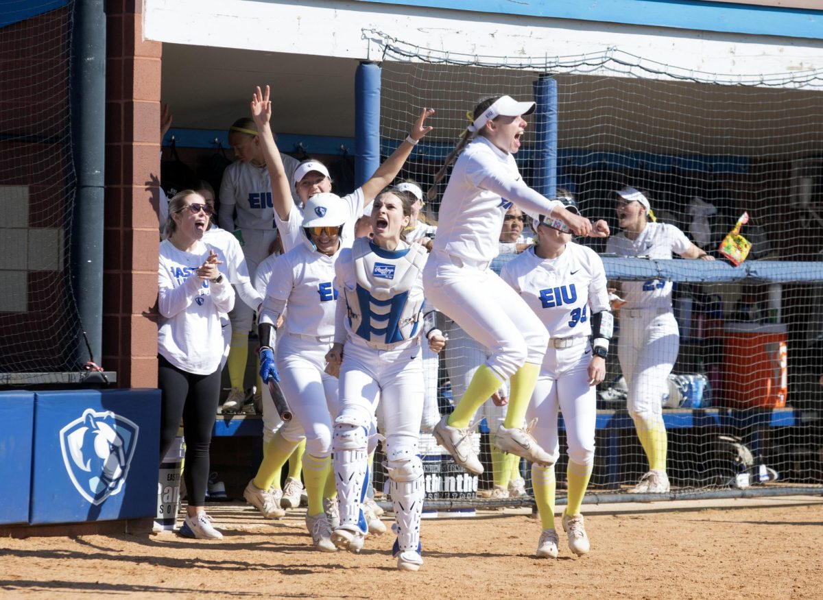 Eastern Illinois University softball team celebrating sophomore infielder Alisha Frederick’s home run hit in the third inning during its annual care game and Eastern softball’s win against Southern Indiana 5-2 at Williams field on Saturday April 12.