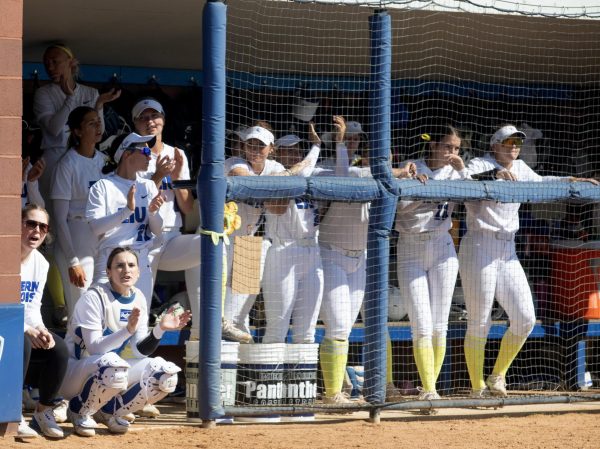 Eastern Illinois softball players wore yellow socks and bows for the Eastern care game for Sarcoma Saturday. 
