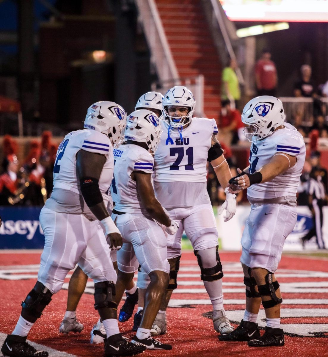 Sebastian Pares Defensive Line celebrates a touch down with this team at the Illinois Sate against Eastern Illinois game at Illinois State University at the Statefarm center lasted season, football game  in Normal Ill