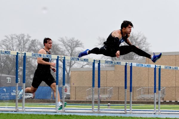 Freshman Sach Wolf (left) and sophomore hurdler Nathan Kirby (right) compete in the men's 110m hurdles event at Eastern's Big Blue Classic at O'Brien Stadium on Saturday, April 5. Kirby won the event with a 15.27 finish. Wolf finished in second place with a 15.94 finish.